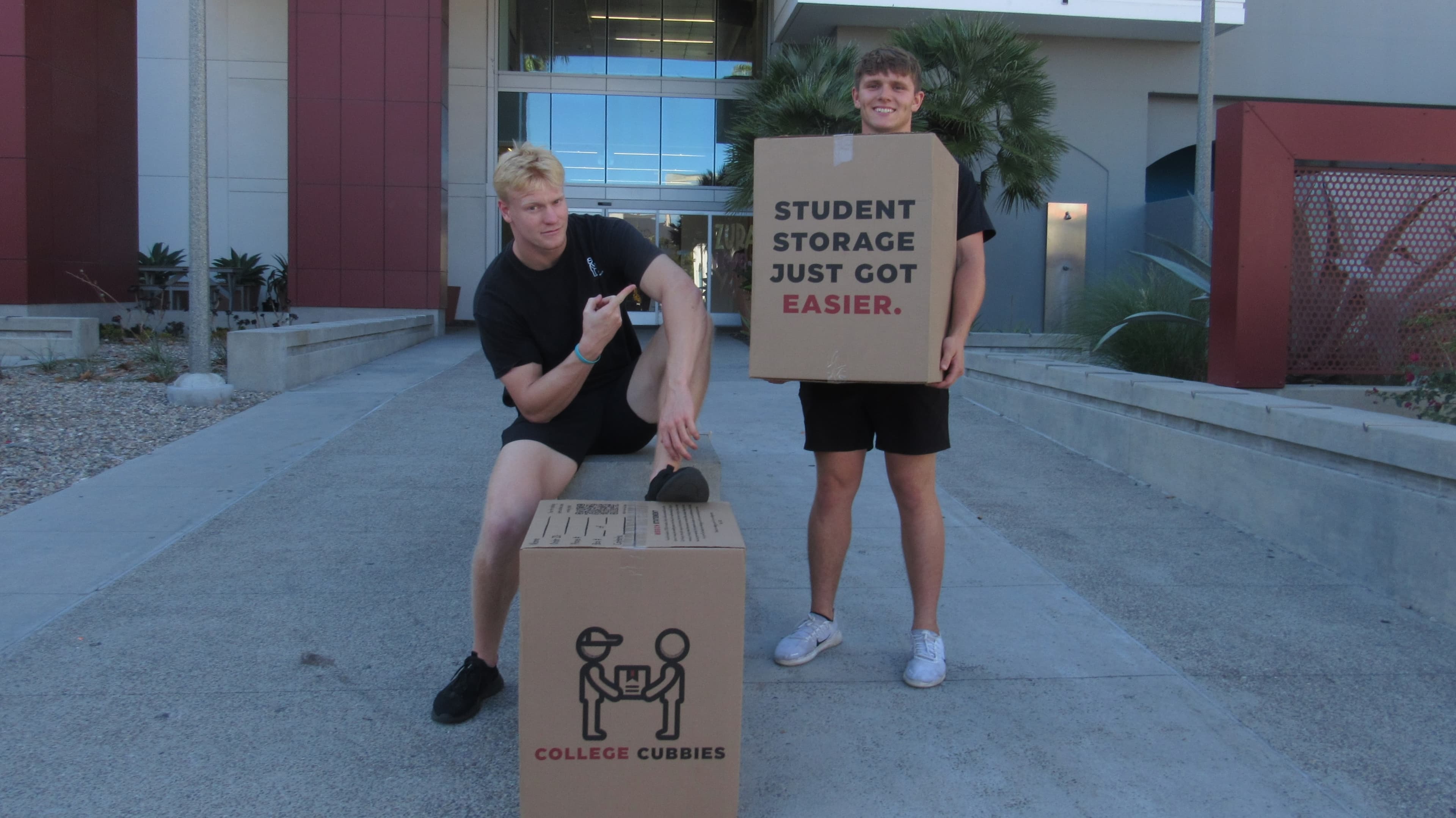 College student with College Cubbies boxes